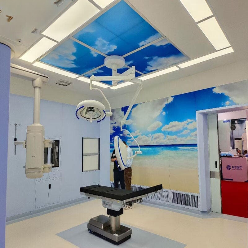 First sample photo of Modern Operating Room that is well lit and complete with Medical Devices.