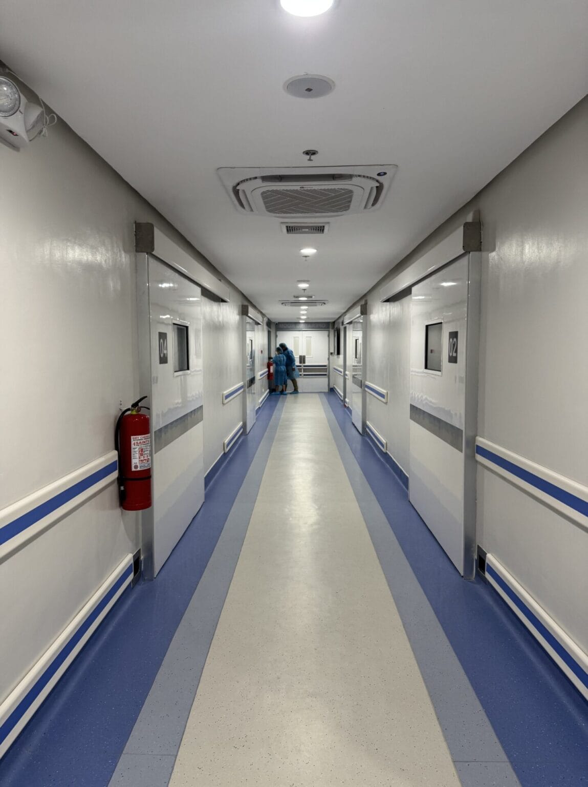 Hermetic doors to operating rooms 02 and 04 along a surgical corridor at JBLMGH, Philippines