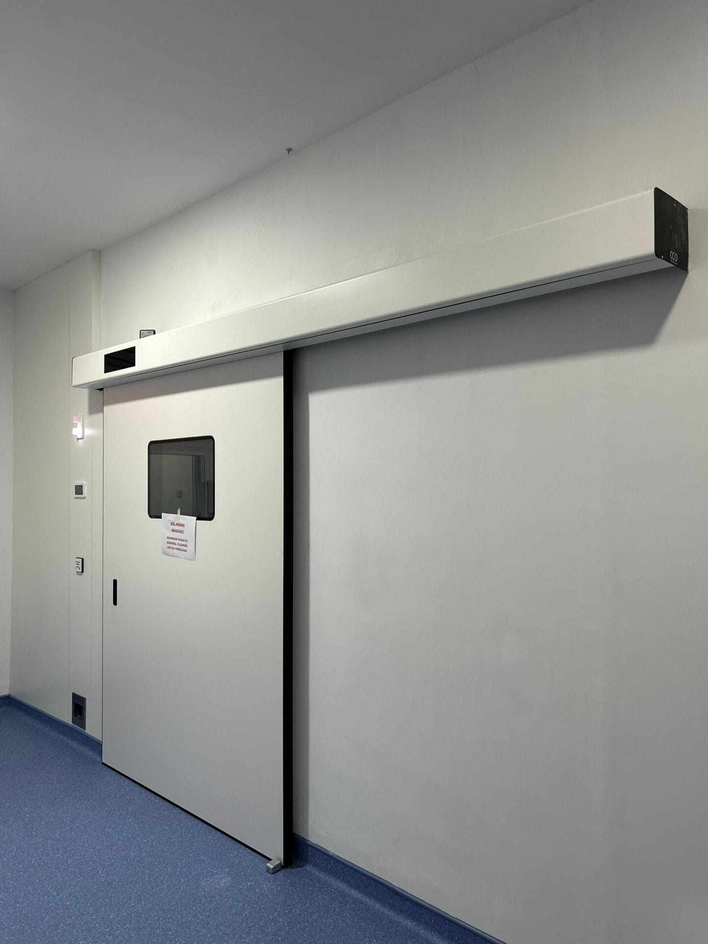 HPL hermetic sliding door installed in operating room at RSUP Ngoerah, Bali