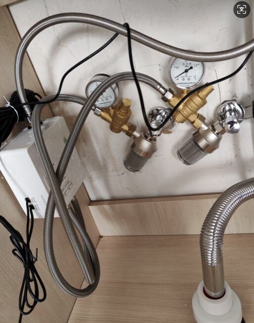 Gas meter with gauges and pipes setup.