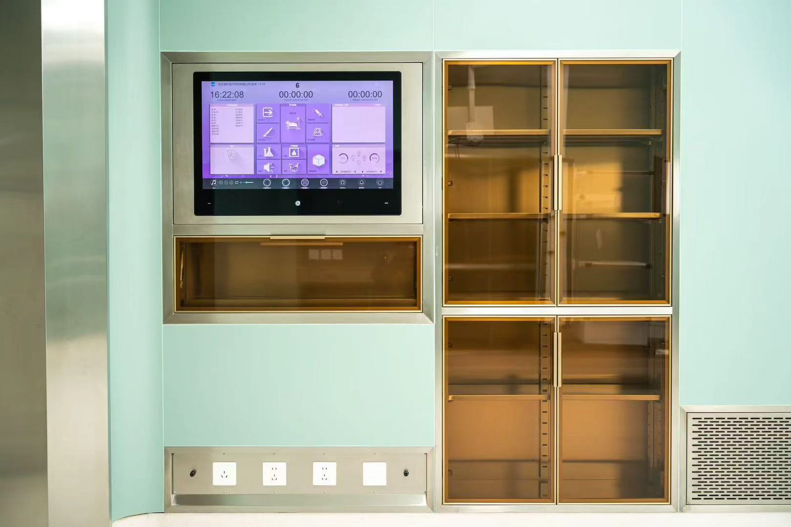 Medical cabinet with digital screen and storage compartments in icarelife modular operating theater