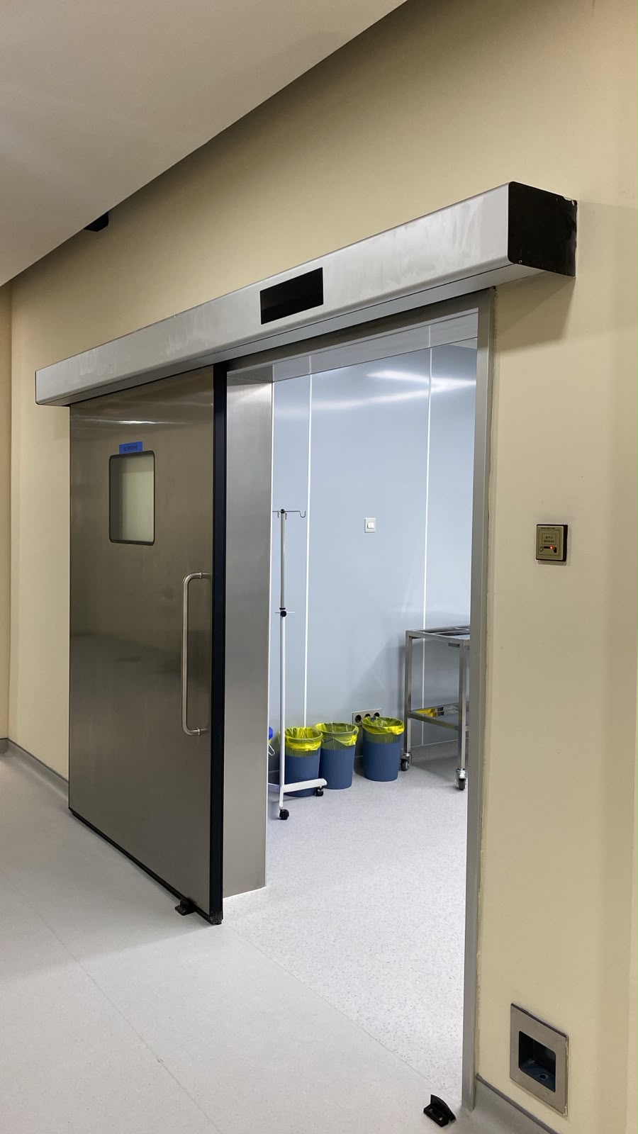 ICARELIFE duo-motor hermetic door with stainless steel finish installed at Bali 911 Dental Clinic