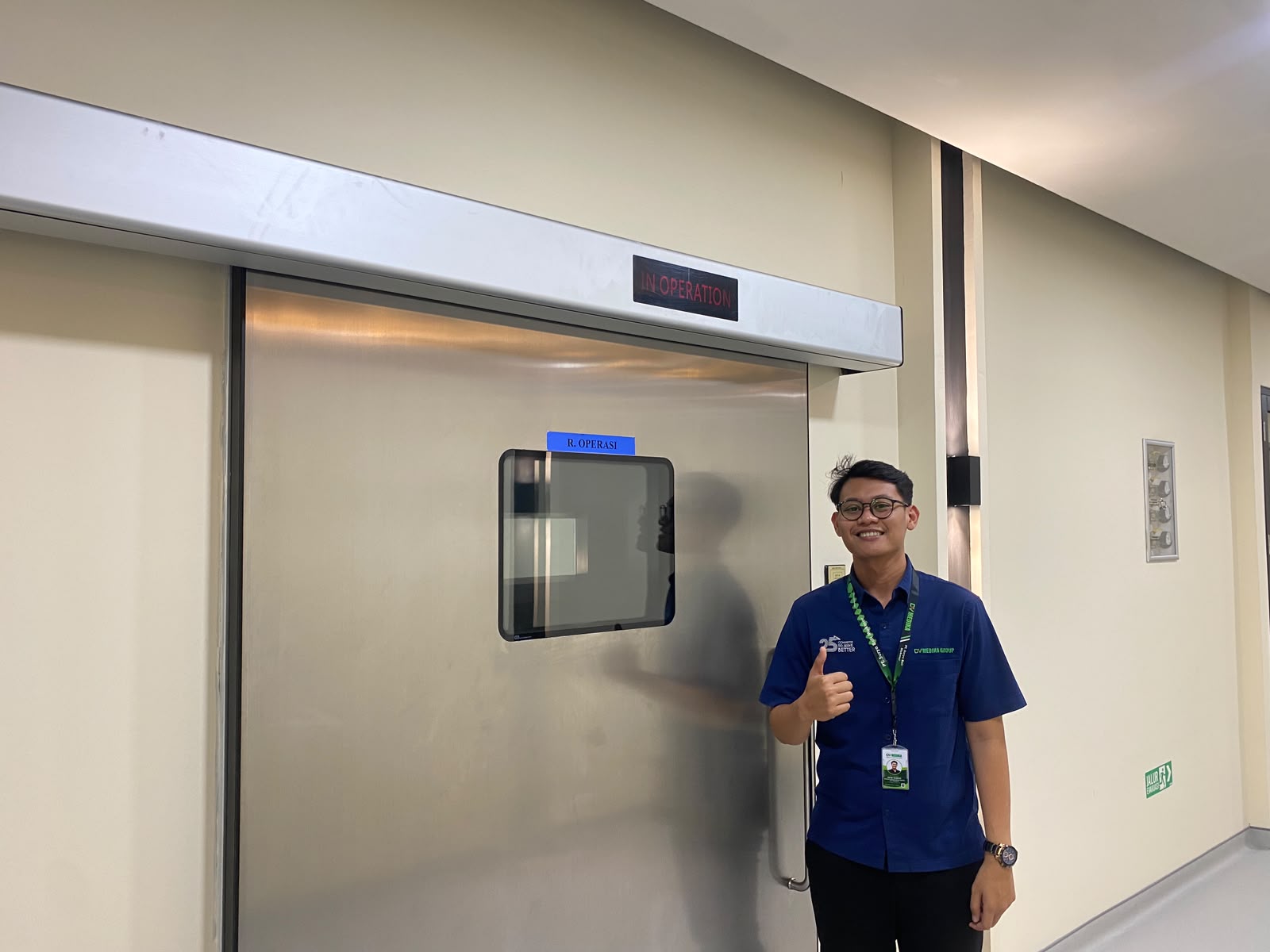 ICARELIFE and DV Medika team performing hermetic door maintenance at Bali 911 Dental Clinic