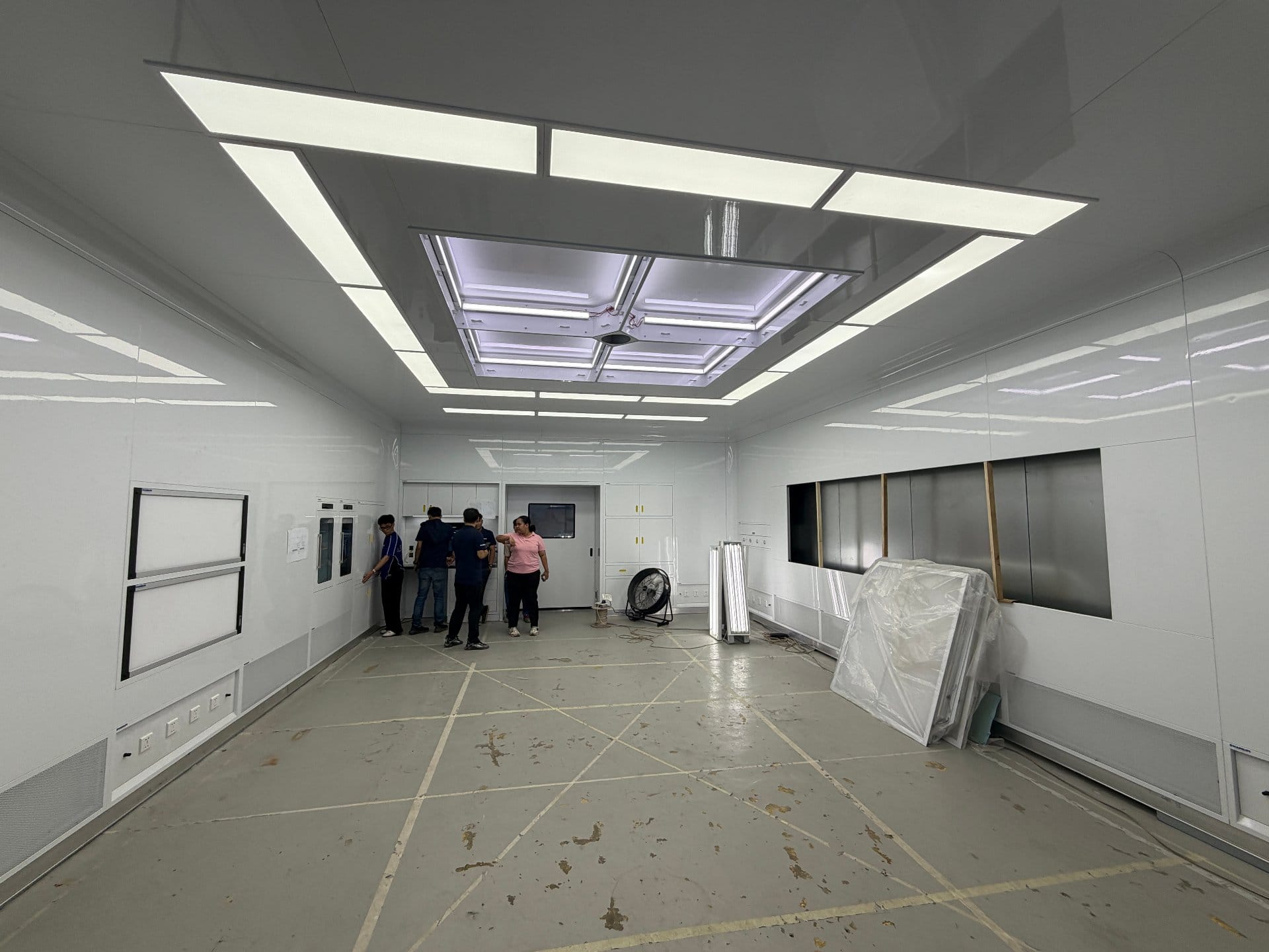 ICARELIFE engineers and partner team inspecting finished operating room on site